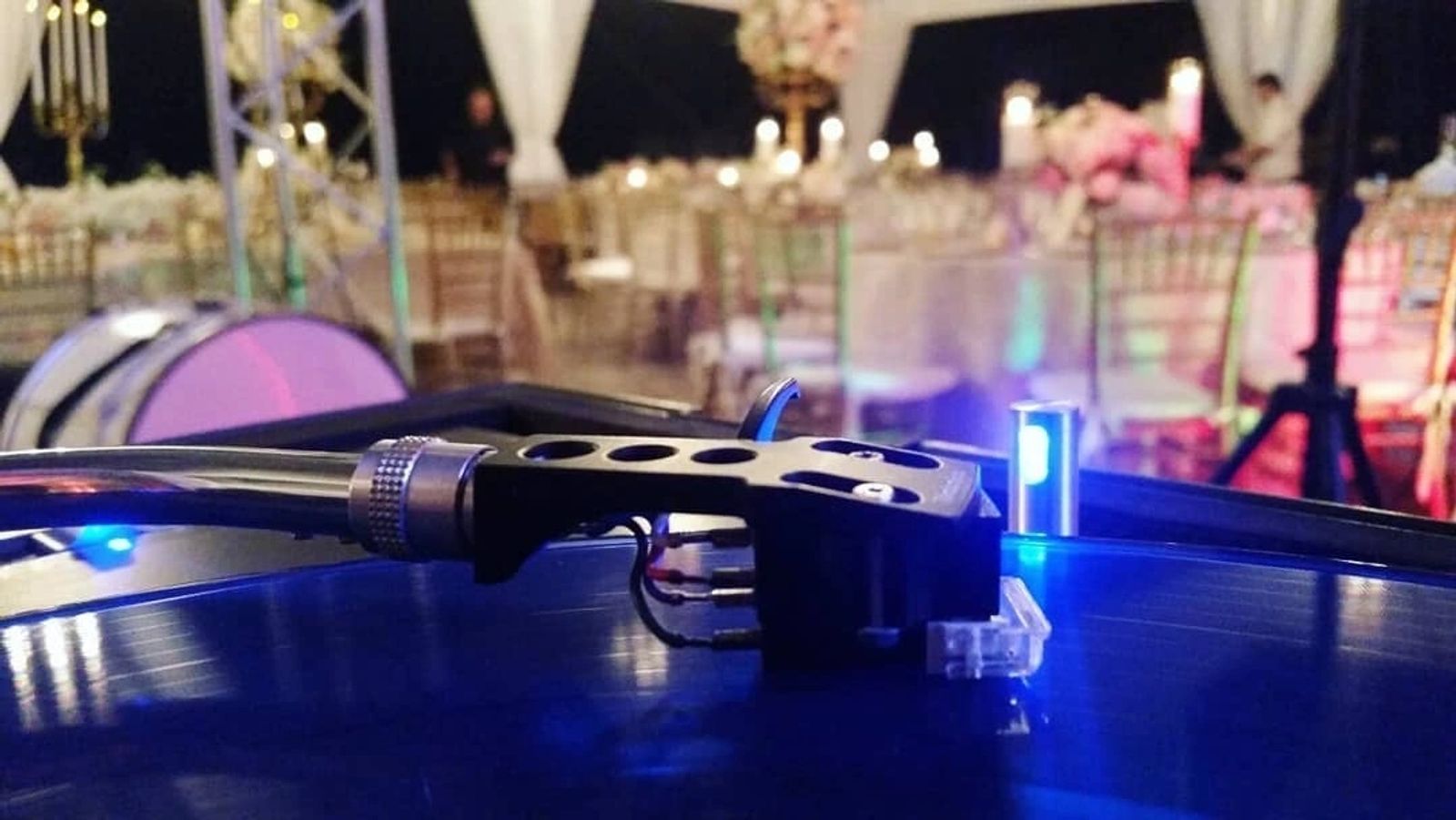 Vibrant wedding reception entertainment with live band and dancers